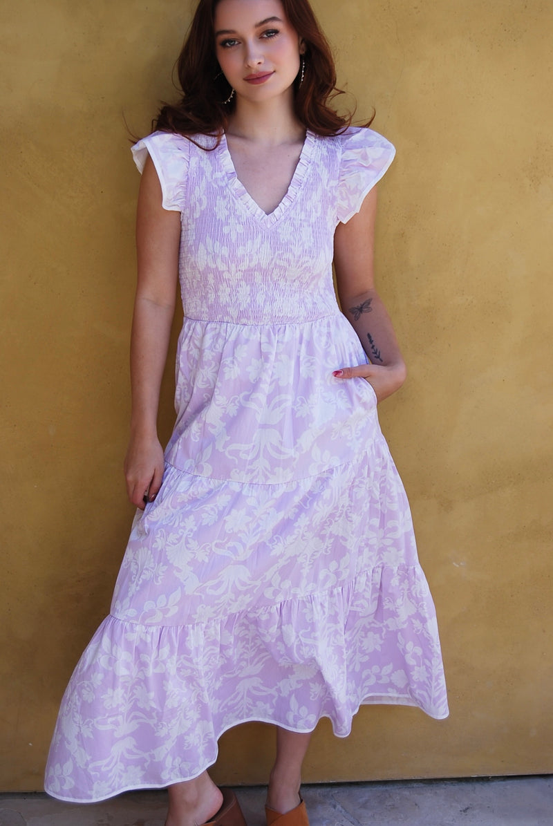light purple floral dress Lavender Smocked Bodice Maxi up back with supportive side loops that tops a hidden back zipper/clasp Light Purple Floral Garden Short