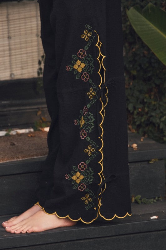 Girl in black pants outdoors 