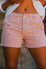 pink splatter print mid rise shorts