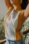 woman in colorful vest with glitter seams