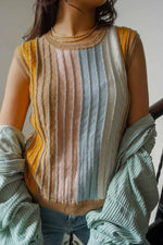woman in colorful vest with glitter seams